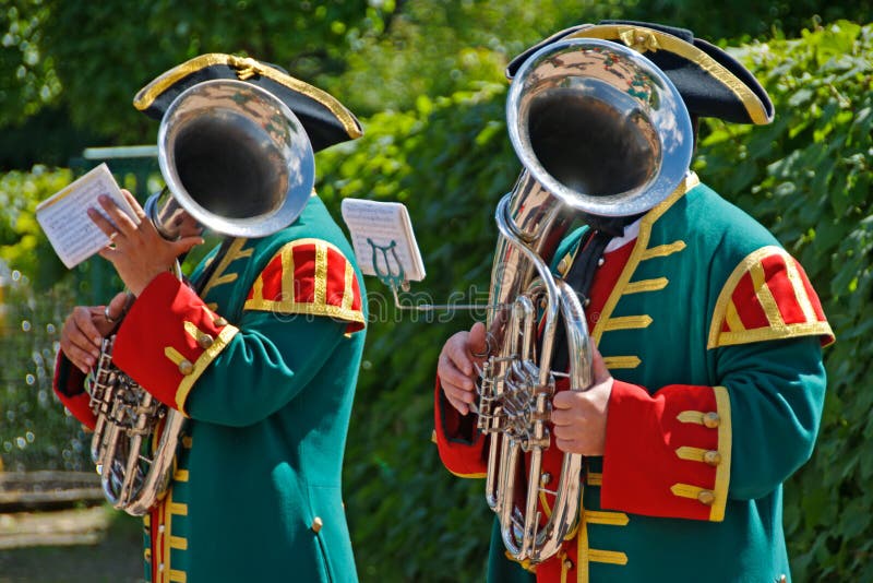 Two parade men with Trombones. Two parade men with Trombones