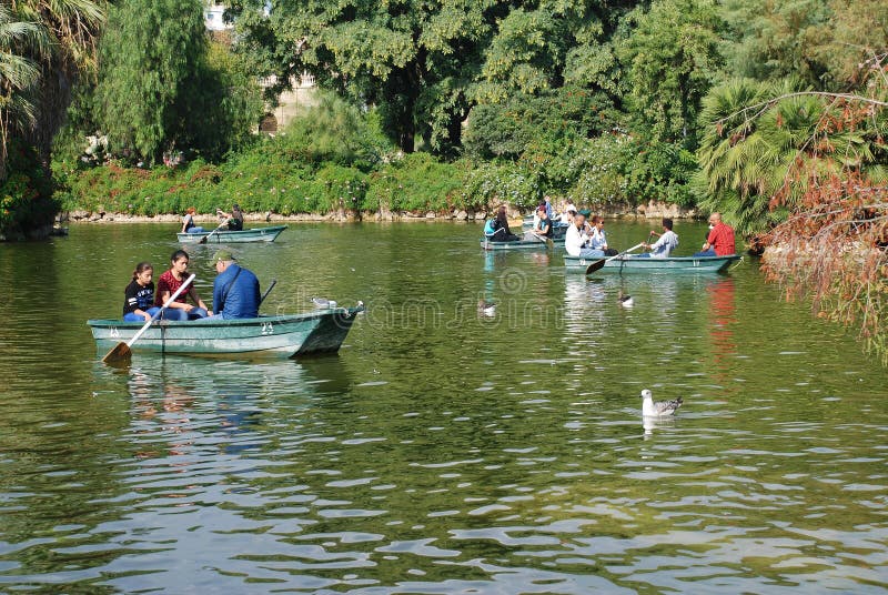 lake with rowing boats for hire in parc de la ciutadella