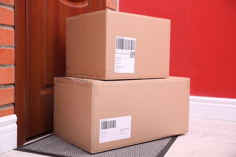 Parcels near door. Delivery service royalty free stock photography