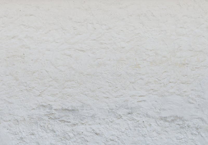 Pared blanca del estuco del viejo vintage con las grietas como fondo fotografía de archivo libre de regalías Pared blanca del estuco del viejo vintage con las grietas como fondo fotografía de archivo libre de regalías