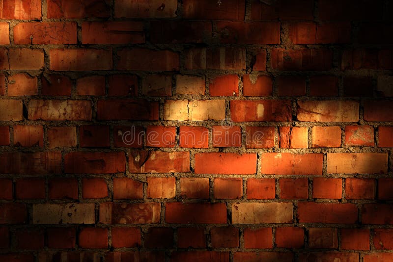 Pared de ladrillo con las sombras de la tarde fotos de archivo Pared de ladrillo con las sombras de la tarde fotos de archivo