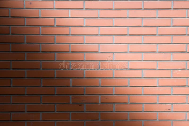 A parede de tijolo marrom vermelha do bloco arranjou belamente o fundo da textura fotografia de stock royalty free A parede de tijolo marrom vermelha do bloco arranjou belamente o fundo da textura fotografia de stock royalty free