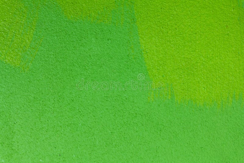 A parede do cimento é verde, que o faz que relaxa imagem de stock A parede do cimento é verde, que o faz que relaxa imagem de stock