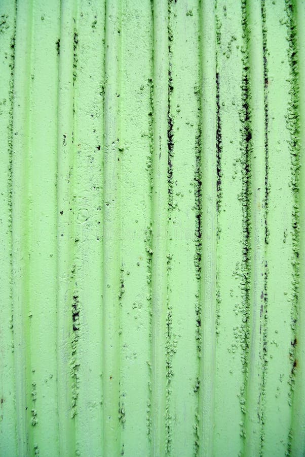 Parede verde-lima texturizada e áspera imagens de stock