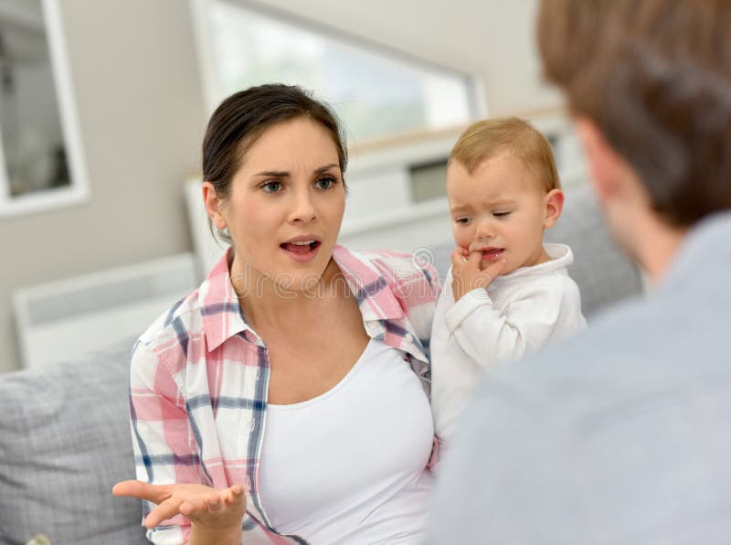 Parents arguing in front of baby royalty free stock photos Parents arguing in front of baby royalty free stock photos