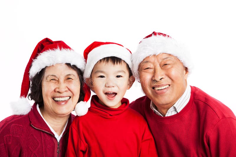 Parents asiatiques célébrant Noël photo libre de droits Parents asiatiques célébrant Noël photo libre de droits