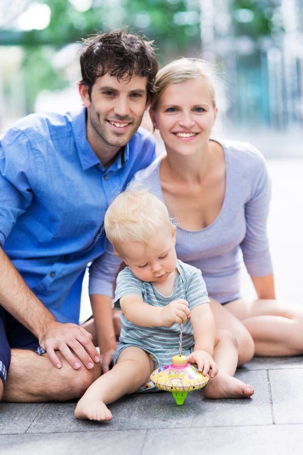 Parents with baby boy stock photo. Image of outdoors 63203162