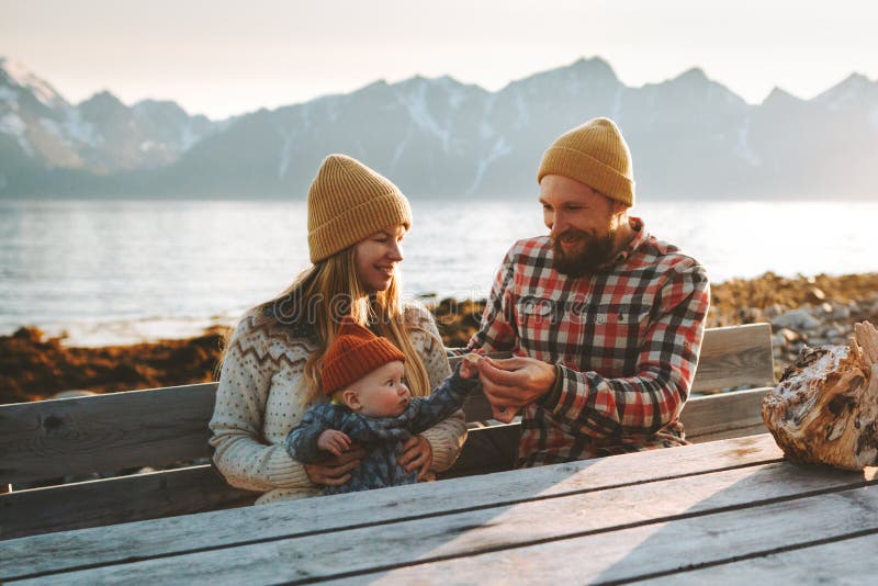 Parents with baby happy family outdoor mother and father with child