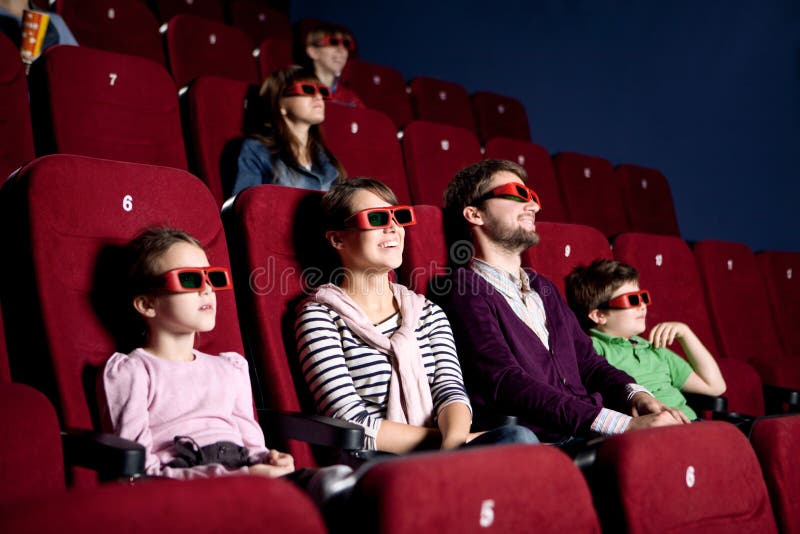 Parents With Children At The Cinema Stock Photo Image of