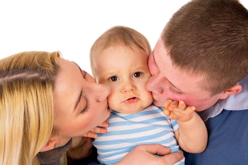 Parents kiss his baby