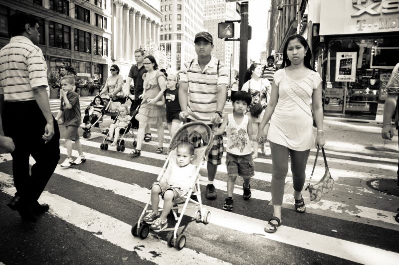 Parents walking the busy streets of new york