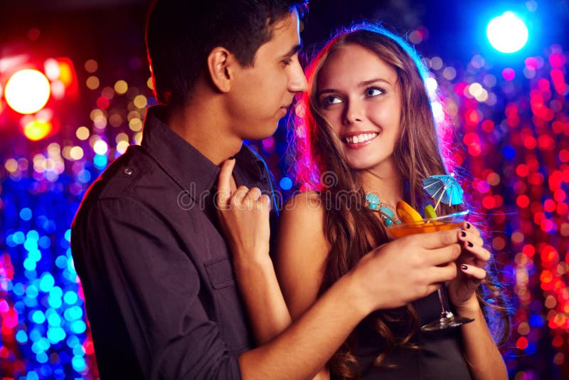 Image of happy couple in the night club. Image of happy couple in the night club