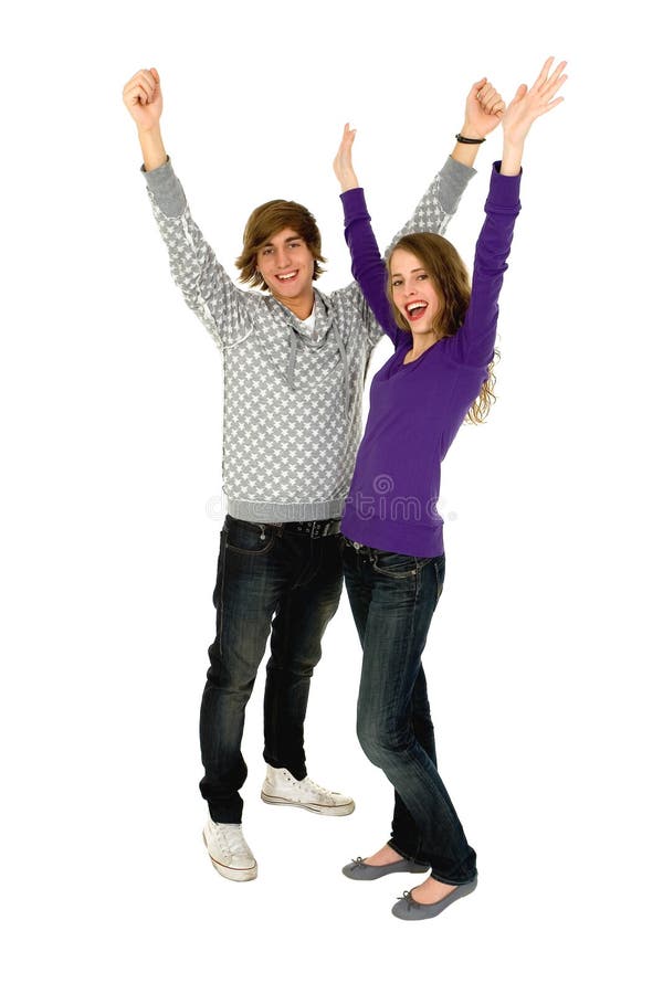 Full length of a happy young couple standing with arms raised. Full length of a happy young couple standing with arms raised