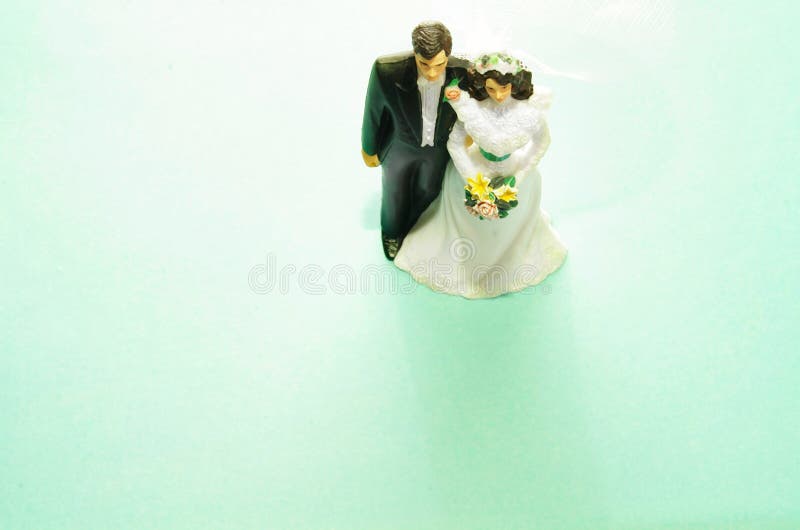 Wedding cake-topper couple, bride and groom. Wedding cake-topper couple, bride and groom