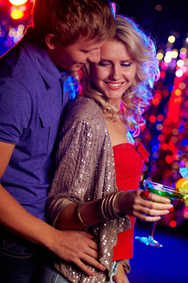 Image of happy couple in the night club. Image of happy couple in the night club