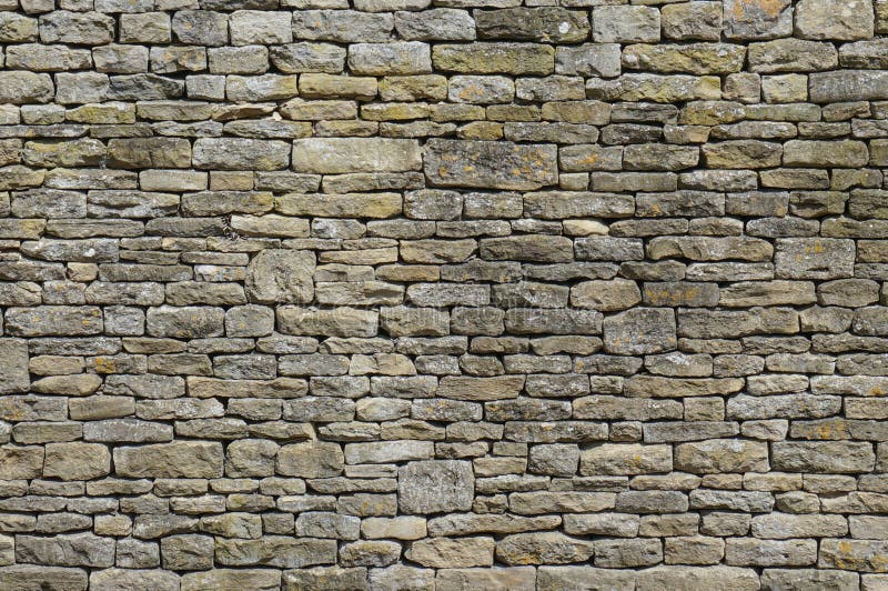 Muro di pietra fotografia stock
