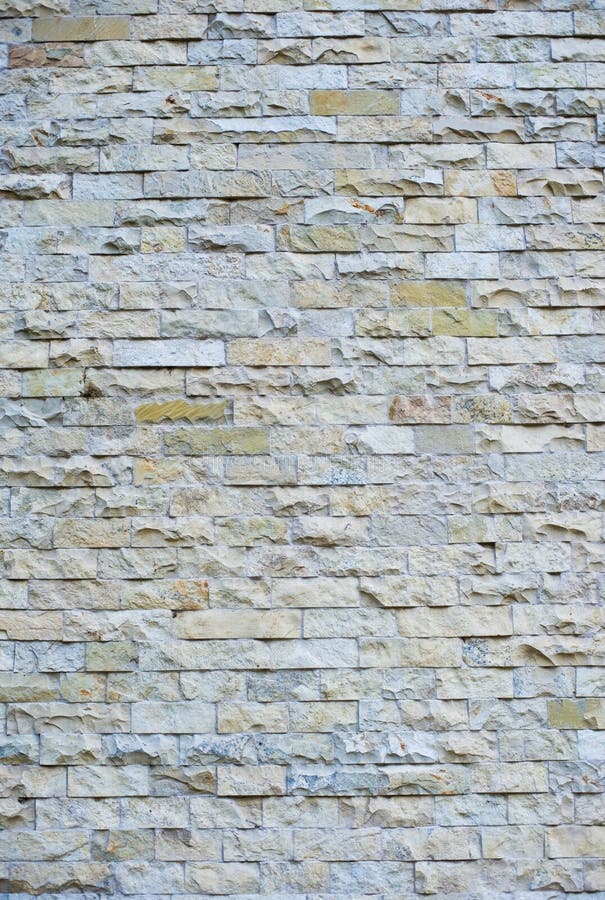 Parete di pietra della piastrellatura senza giunte. fotografia stock libera da diritti Parete di pietra della piastrellatura senza giunte. fotografia stock libera da diritti