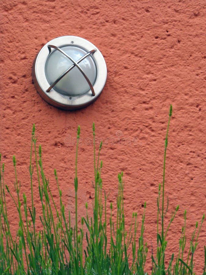 An image of orange wall and light - outside. An image of orange wall and light - outside