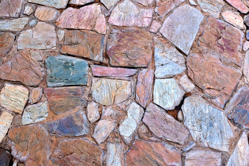 Parete naturale fatta dalle rocce e dalla pietra È usato per fondo e struttura fotografia stock Parete naturale fatta dalle rocce e dalla pietra È usato per fondo e struttura fotografia stock