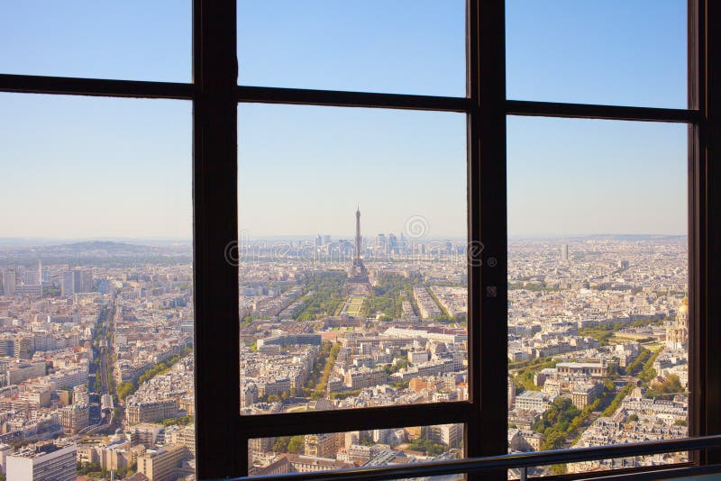Paris behind window.