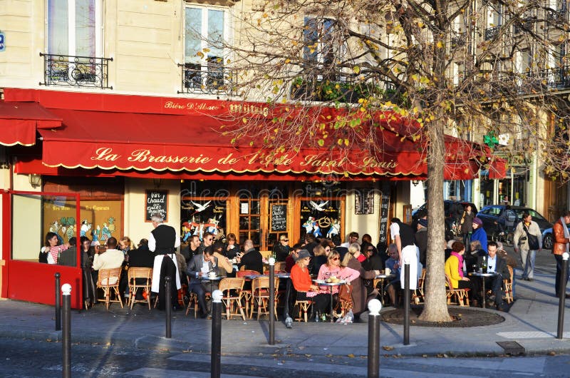 Street cafe in Paris, France, in the evening sun. Street cafe in Paris, France, in the evening sun