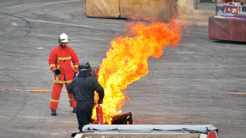 Paris, France - April 2019: Stuntman at motor show exhibits in the flames