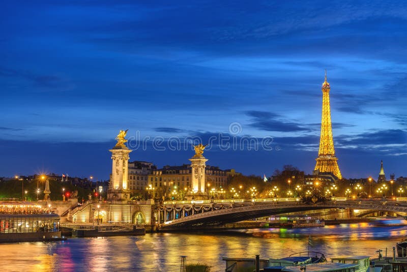 Paris France city skyline night at Seine River royalty free stock photo