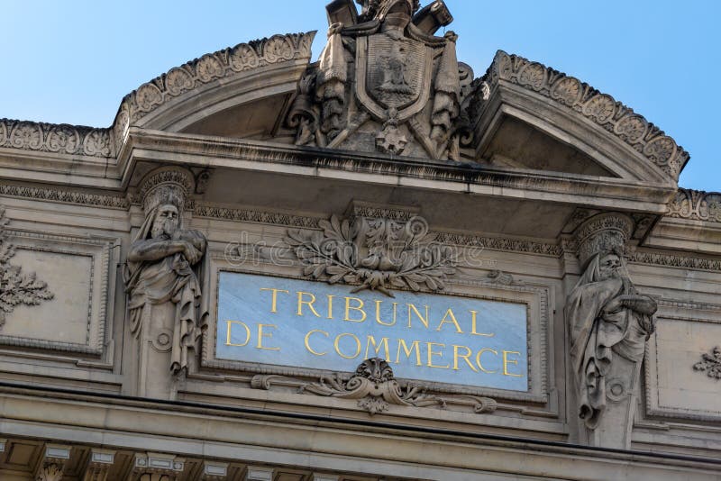 Close-up of the sign at the top of the Commercial Court (\ Tribunal de Commerce\ ) of Paris, France