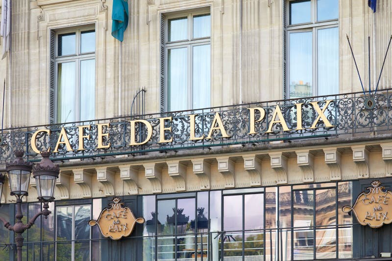 Famous Cafe  De  La Paix Sign  In Golden Letters In Paris  