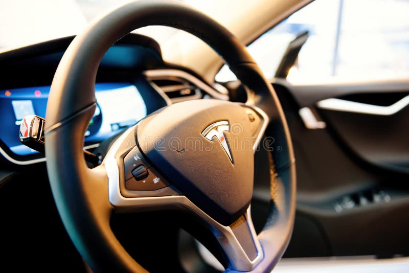 Steering wheel of a new Tesla Model S 3 electric car with multiple buttons on