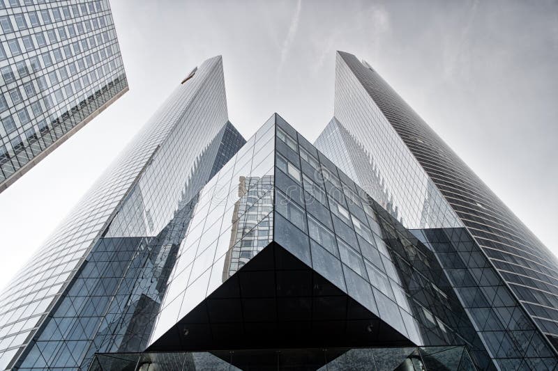 Paris, France - September 29, 2017: grey glass buildings. Tower building in La Defense. Building construction. City