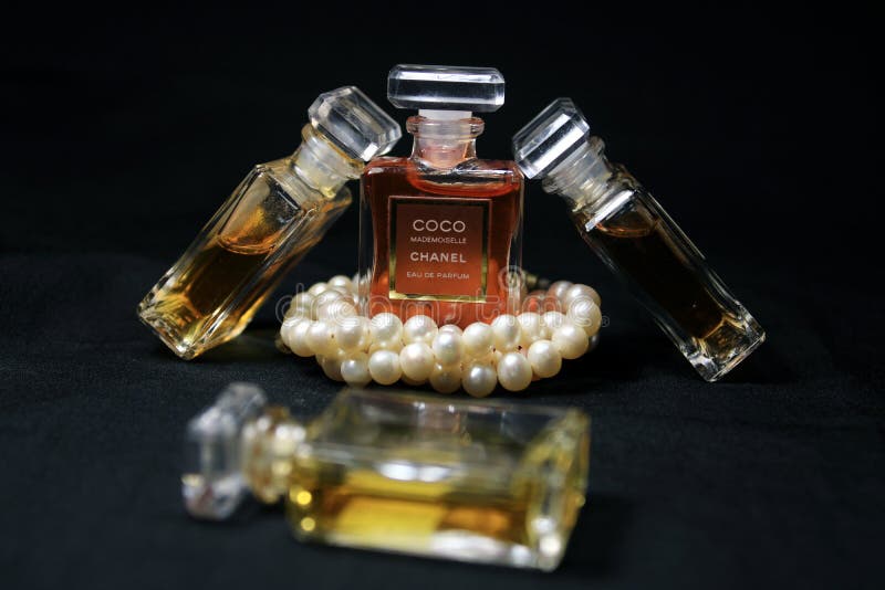 Chanel Perfume Bottles Isolated On Black Background. Bottles With Different  Chanel Perfume Products. Editorial Stock Image - Image of fragrances,  brand: 182849749