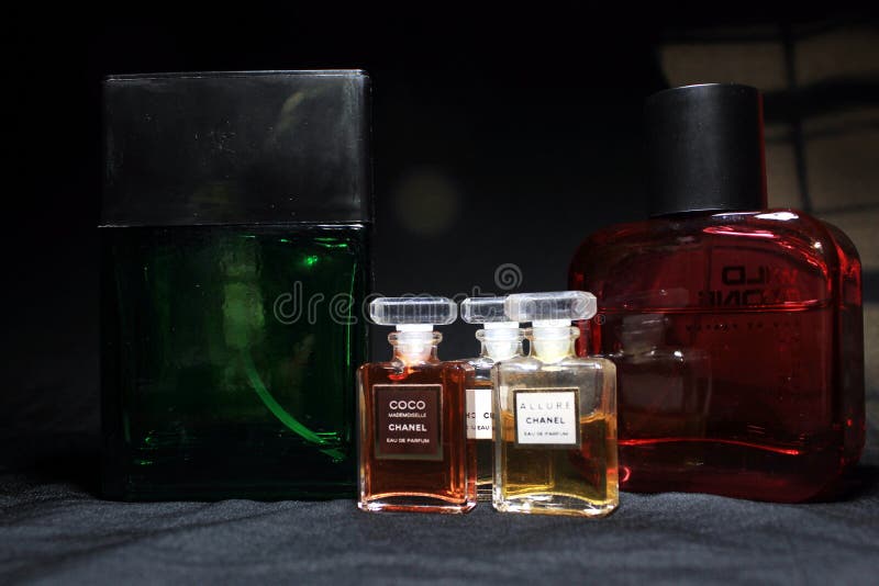 Chanel Perfume & Wild Stone Bottles Isolated on Black Background. Bottle  with Coco Chanel & N`5 Chanel Perfume Product Editorial Photo - Image of  famous, closeup: 182907946