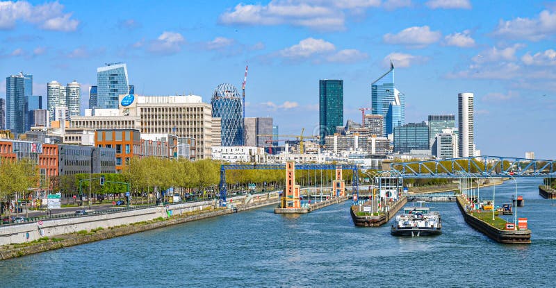 Paris, Frane - 06.04.2014: Business district of La Defense  the river Seine in the foreground  Paris  France
