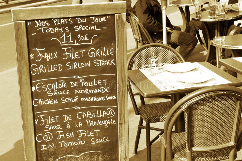 French restaurant terrace and menu on display in Paris. French restaurant terrace and menu on display in Paris