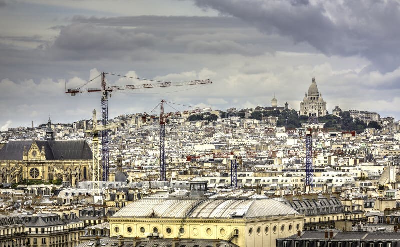 Paris under construction with Sacre Coeur Basilica on the hill stock photography Paris under construction with Sacre Coeur Basilica on the hill stock photography