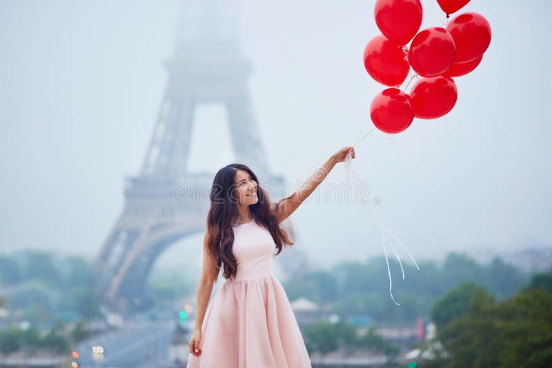 Parisian Woman with Red Balloons in Front of the Eiffel Tower Stock ...