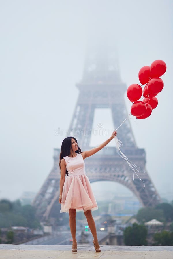 Parisian Woman with Red Balloons in Front of the Eiffel Tower Stock ...