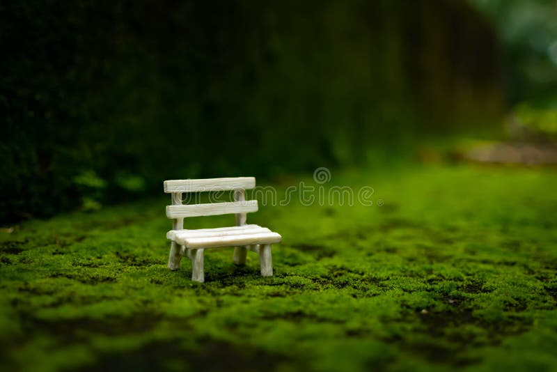 A Park Bench on Green Surface with a Nice Blurry Bokeh Effect. Miniature  Photography Art, Light Bokeh, Photography, Background, Stock Image - Image  of bokeh, electric: 180638489