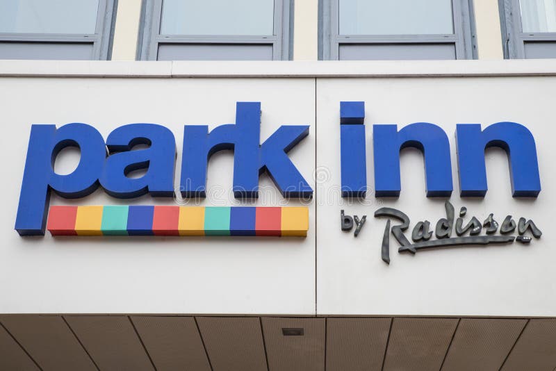 YORK, UK - JULY 20TH 2017: The Park Inn by Radisson logo one th exterior of their hotel in the city of York, UK, on 20th July 2017. YORK, UK - JULY 20TH 2017: The Park Inn by Radisson logo one th exterior of their hotel in the city of York, UK, on 20th July 2017.