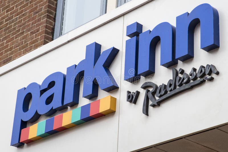 YORK, UK - JULY 20TH 2017: The Park Inn by Radisson logo one th exterior of their hotel in the city of York, UK, on 20th July 2017. YORK, UK - JULY 20TH 2017: The Park Inn by Radisson logo one th exterior of their hotel in the city of York, UK, on 20th July 2017.