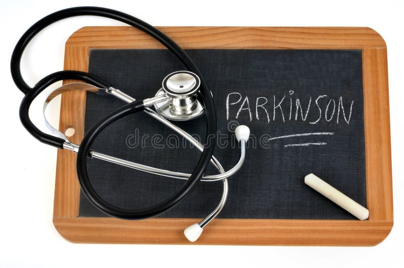 Parkinson`s disease concept with school slate and stethoscope. Parkinson`s disease concept with school slate and stethoscope