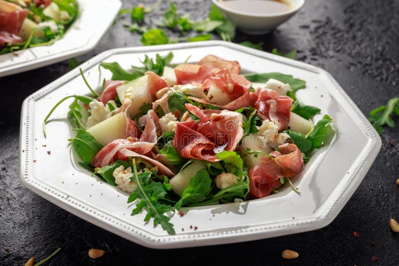Parma Ham and Melon Salad with Mozzarella, Rocket and Pine Nuts Stock