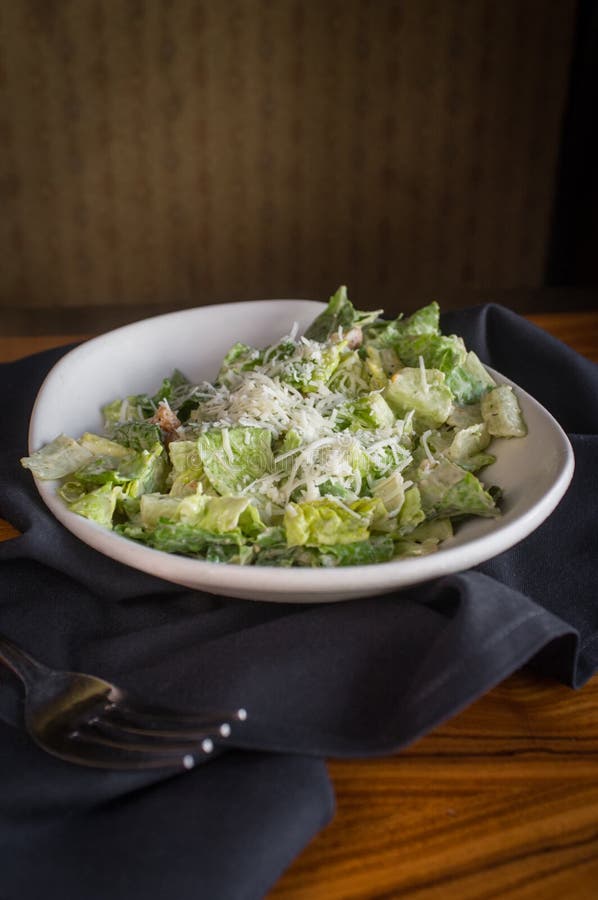 Parmesan Caesar Salad stock photo. Image of dinner, plate 76513952