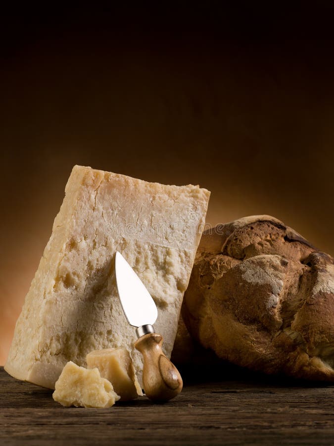 Parmesan cheese and bread stock photo. Image of knife 19351786