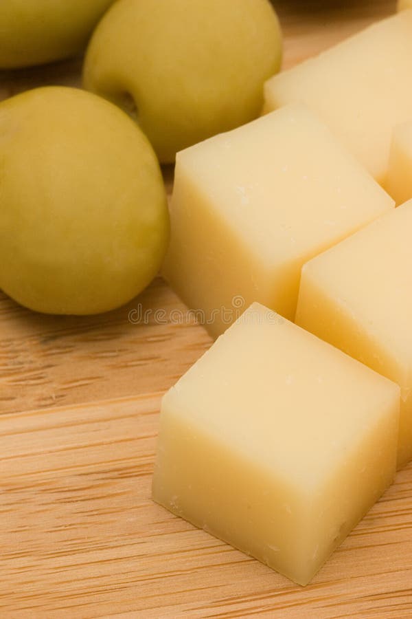 Parmesan cheese with olives