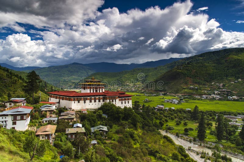 Paro Dzong `s correct name is Rinchen Pung Dzong , this dzong is built on a steep hillside . This Dzong is quite famous fortress to for foreigners because of the movie little buddha . Bhutan ,as known as the thunder dragon kingdom , in summer days are quite cloudy , we could see the floating clouds cover the mountains , and that make the castle looks more beautiful . Paro Dzong `s correct name is Rinchen Pung Dzong , this dzong is built on a steep hillside . This Dzong is quite famous fortress to for foreigners because of the movie little buddha . Bhutan ,as known as the thunder dragon kingdom , in summer days are quite cloudy , we could see the floating clouds cover the mountains , and that make the castle looks more beautiful .
