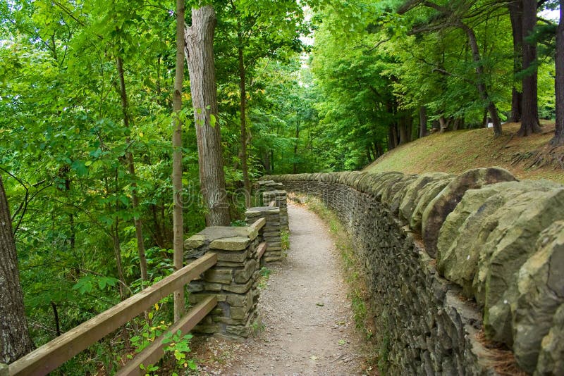Looking at a stone walled pathway alongside the canyon at beautifull Letchworth State Park in New York state. Looking at a stone walled pathway alongside the canyon at beautifull Letchworth State Park in New York state.