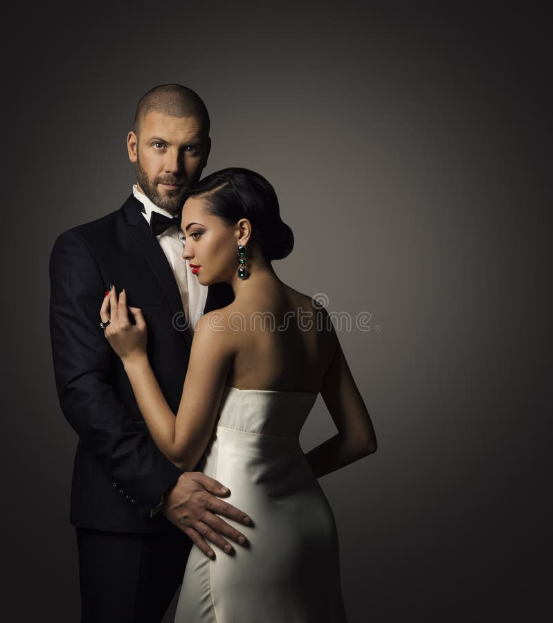 Parskönhetstående, väl klädd man, elegant kvinna royaltyfri bild