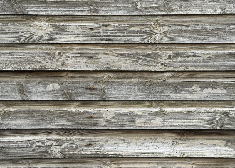 Detail of a weathered wooden outbuilding in need of some attention. Detail of a weathered wooden outbuilding in need of some attention.